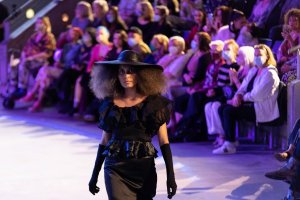First Nations Fashion: Walking in Two Worlds, presented by Grace Lillian Lee Productions, Brisbane Festival 2021. Model shown wearing design by Cheryl Creed for the label Murrii Quu Couture. Photography by Atmosphere Photography.