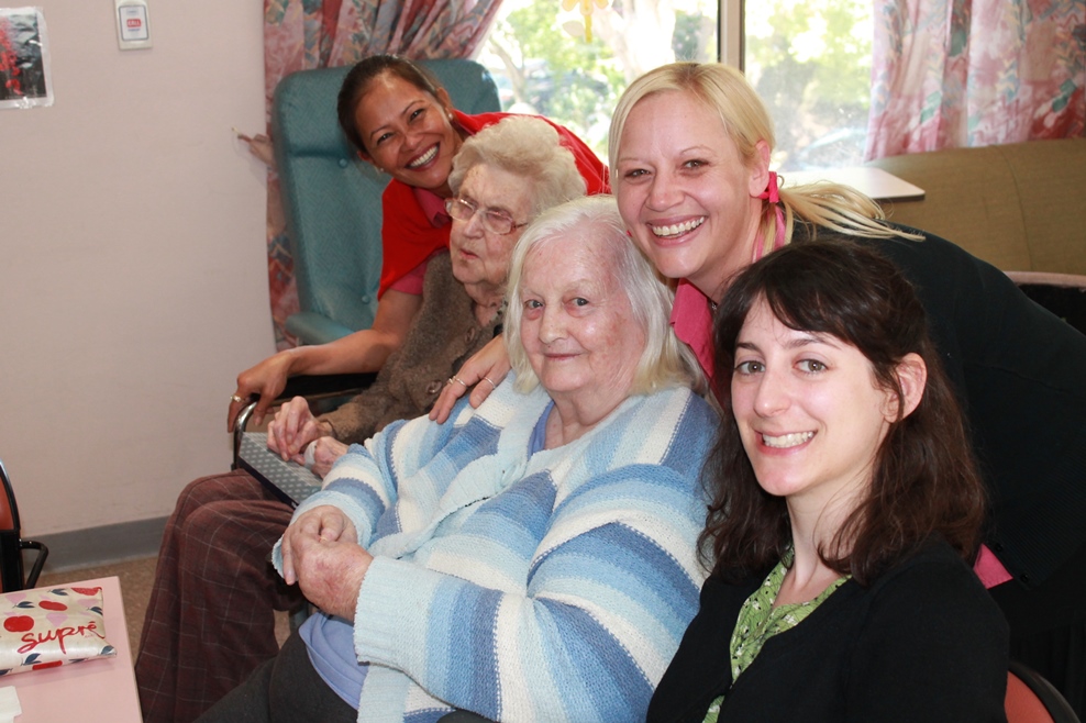 Photo of Gemma, staff and elders 